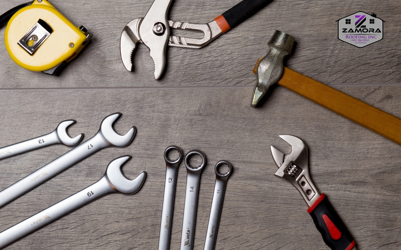 A variety of tools laid out for DIY roofing repair